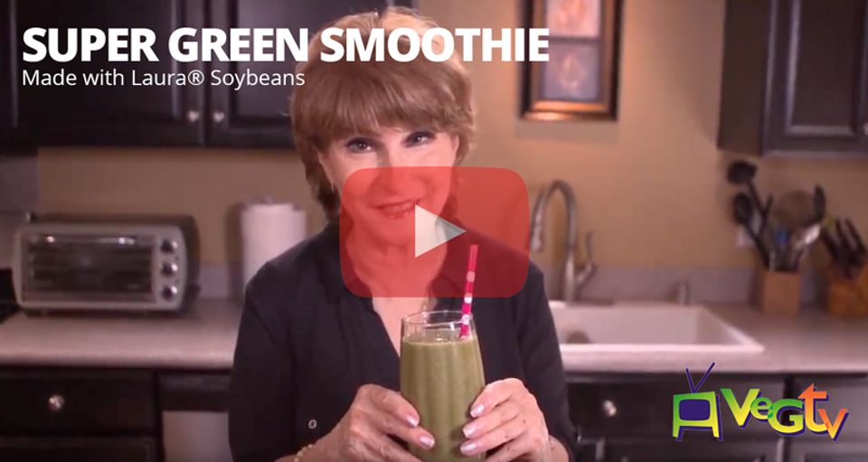 Screencap of YouTube vide with Marie Oser holding a green smoothie and the title "Super Green Smoothie Made with Laura Soybeans"