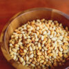Tosteds dry roasted soybeans in a wooden bowl.