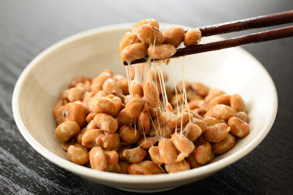 a bowl with Natto fermented soybeans