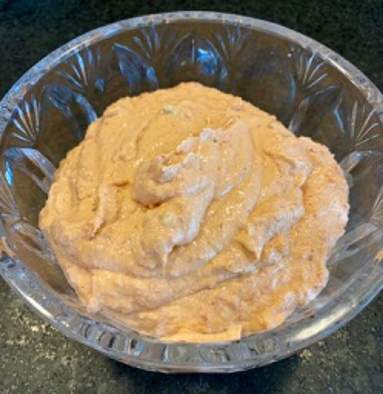 A bowl filled with soybean hummus.