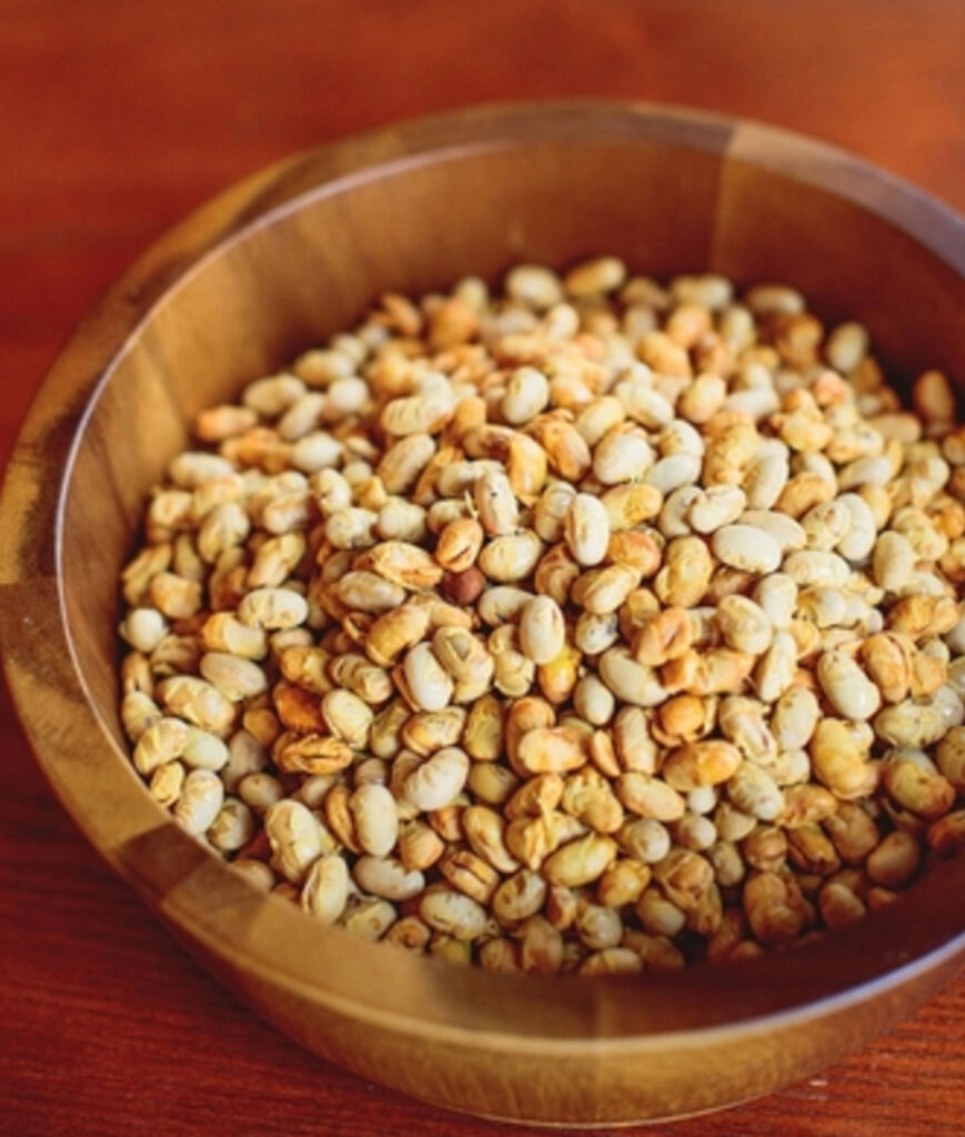 Dried Laura Soybeans in a wooden bowl.